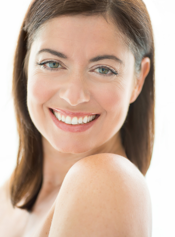 portrait of a beautiful mature lady looking at the camera with a confident smile